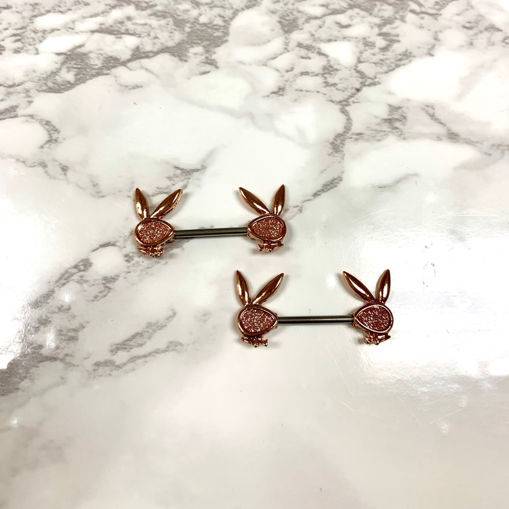 Glitter rose gold Playboy nipple rings